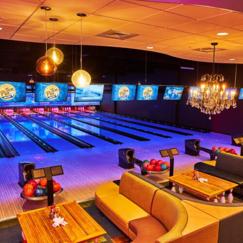 VIP area, Center Stage seating, Sync, ball returns, and lanes under black light